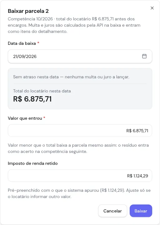 Diálogo de baixa da parcela com o campo Imposto de renda retido preenchido com o valor apurado