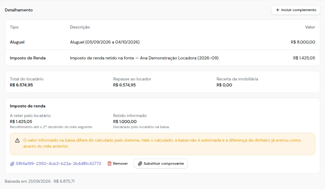 Parcela baixada com o comprovante da retenção anexado, com as opções de remover e substituir